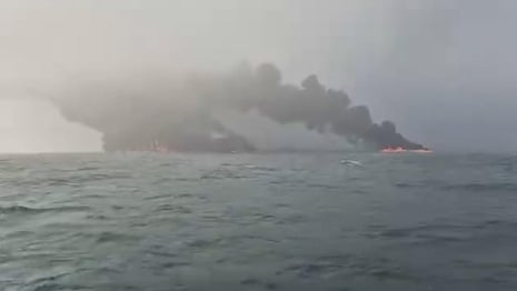 Footage shows oil tanker and cargo vessel on fire in North Sea – video 