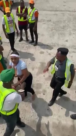 Viral Press Authorities removing a passenger from an Ibom Air flight on Sunday, Aug. 10, 2025