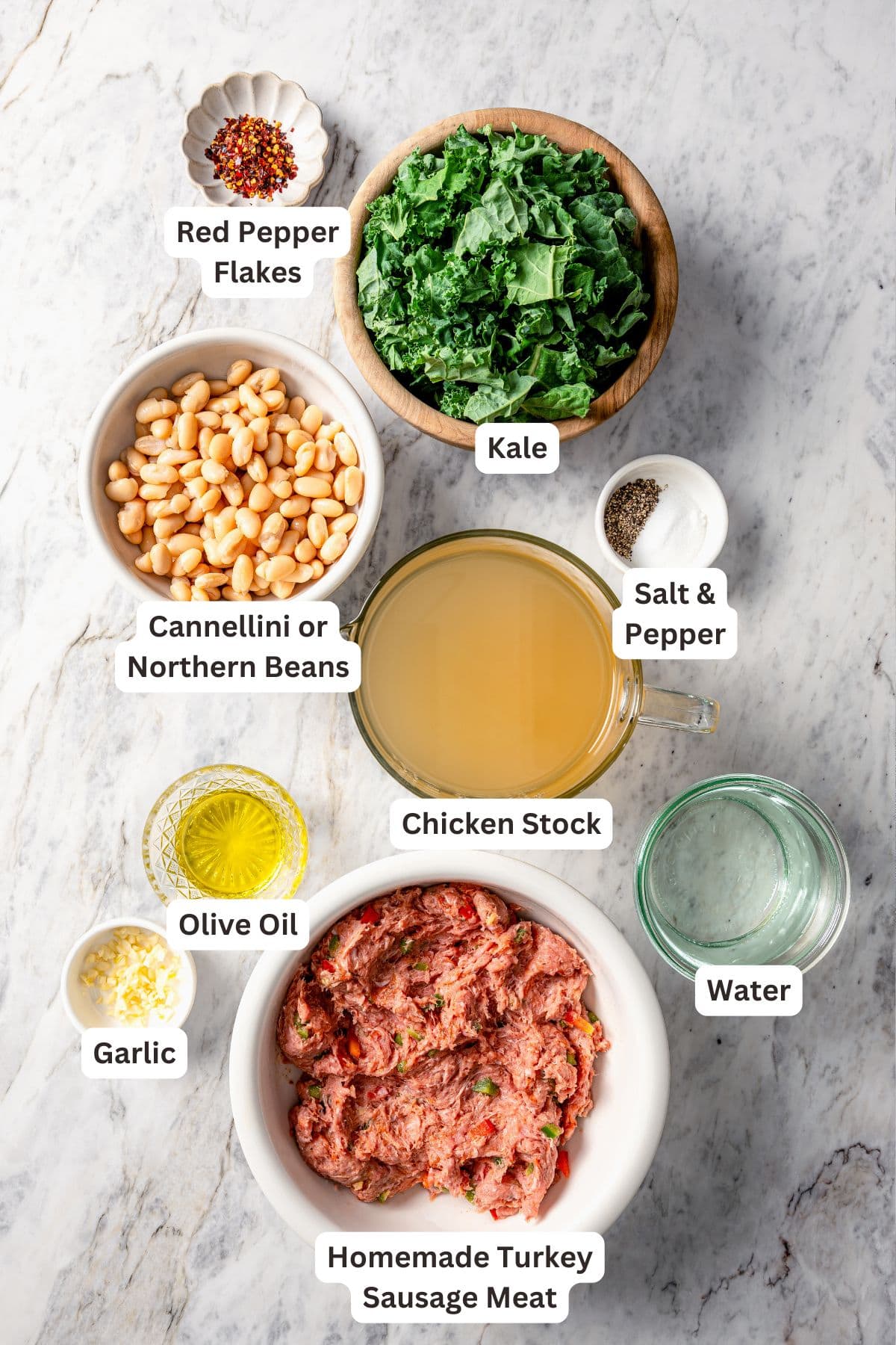 Ingredients for white bean soup with sausage and kale.